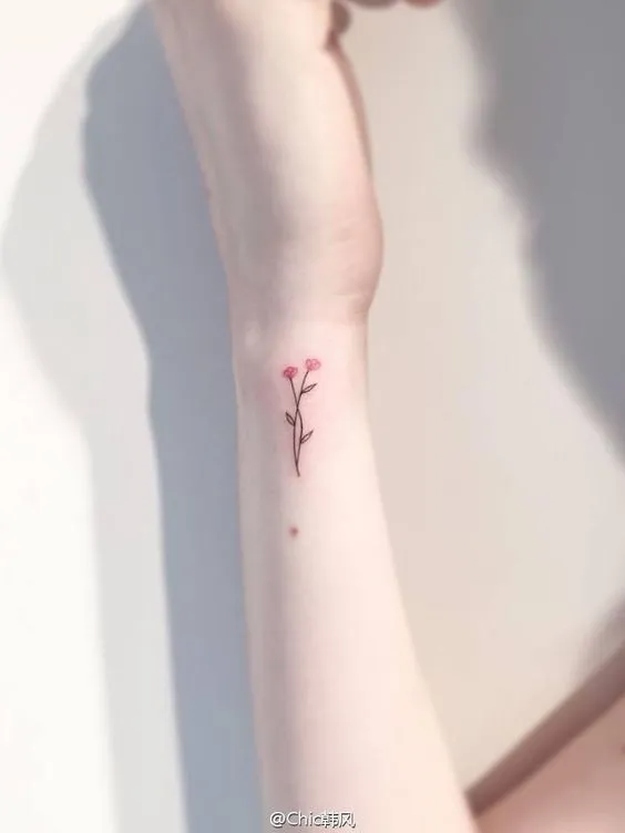 tiny flower tattoo1